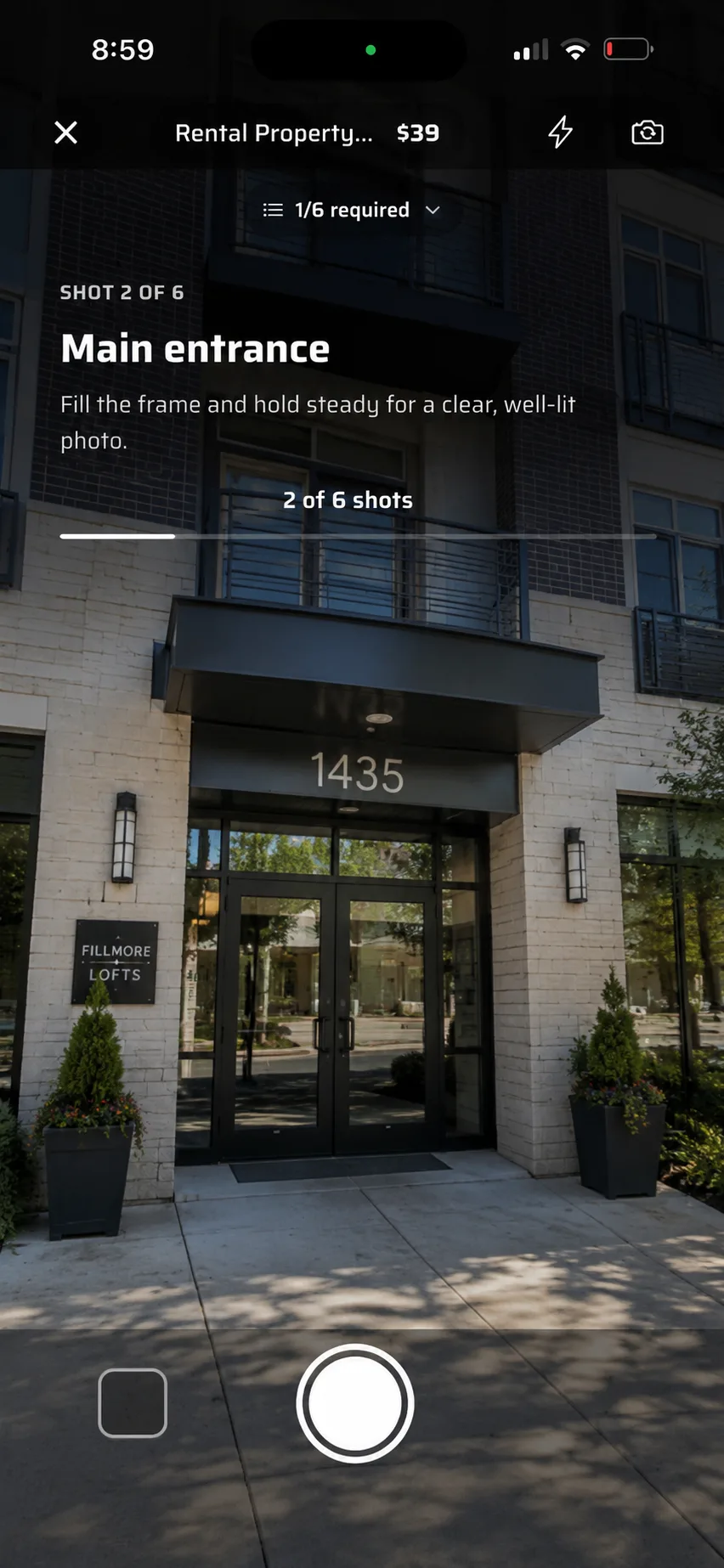 The in-app camera on shot 2 of 6, captioned Main entrance.